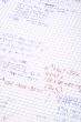 hand written maths calculations with teacher`s corrections in re