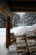 Wood pile under mountain hut