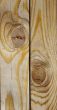 Knot on textured wooden plank