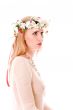 Pretty spring girl with wreath on head looking forward