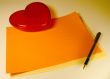 Heart, color paper, pen.