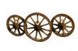 Three wooden wheels.