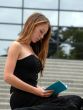 sitting reading girl