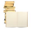 lined exercise book with books in background
