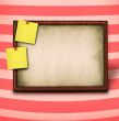 wooden frame and to yellow notes