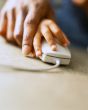 Hand with computer mouse
