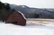 old snow covered barn