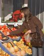 Woman buying fruits