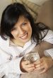 young beautiful woman with glass of mineral water