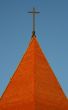 The top part and cross of Catholic church.