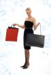 shopping blond in black dress with snowflakes