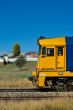 Freight Train Passing through a Residential Area