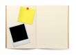 exercise book with photo frame and yellow note