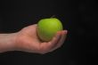 Holding an Apple