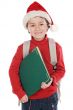 child studying with Santa Claus hat