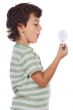 boy holding bulb