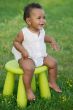 Toddler playing with chair