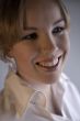 Portrait of a smiling blond curly woman