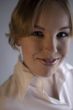 Portrait of a cute blond curly woman