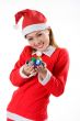 cute santa with tiny gifts smiling
