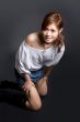 young girl kneeling