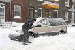 Man shovelling and removing snow