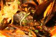 Pasta with mussels, tomato and parsley