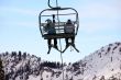 Skiers on chairlift