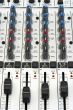 Faders and knobs of sound mixer