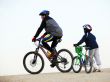 father and the son with bicycles