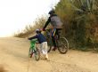 father and the son with bicycles