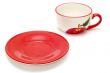 tea cup and red saucer