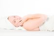 Wellness girl series laying down and touching