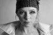 Fashion portrait of a blond girl in black and white