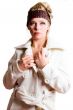 Fashion portrait of a blond girl in a white coat