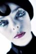 Artistic blond girl wiyh blue eyes