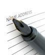 pen tip and address book