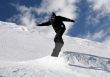Snowboarder jumping