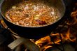 Cooking pilaf on fire
