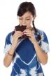adorable girl eating chocolate