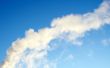 Dark blue sky, white smoke.