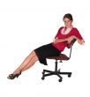 Professional  lady leaning back in office chair