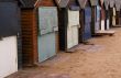 A row of beach huts during the winter months.