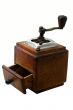 retro coffe-mill with coffee-beans and isolated