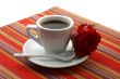 white cup of coffee with a red rose