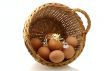  few eggs in basket with one decorated