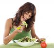 teenager eating salad