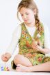 Young girl painting eggs for Easter