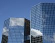 Mirrored Skyscrapers Joined by Bridge