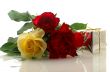 three nice roses with a gift box